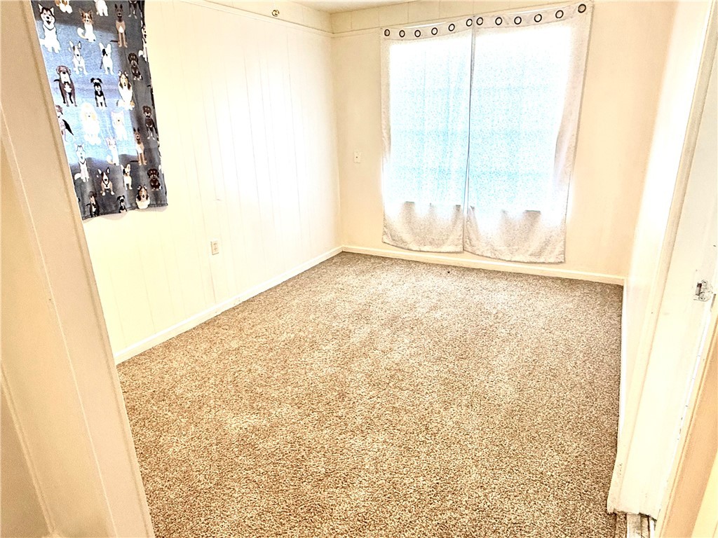 359 6th Street Somerville, TX 77879 - Photo 6 of 17 a view of a room with a window