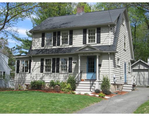 53 Dexter Road Lexington, MA 02420 - Photo 1 of 12 a front view of a house with a yard