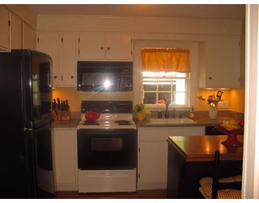 53 Dexter Road Lexington, MA 02420 - Photo 3 of 12 a kitchen with stainless steel appliances granite countertop a stove a refrigerator and a sink