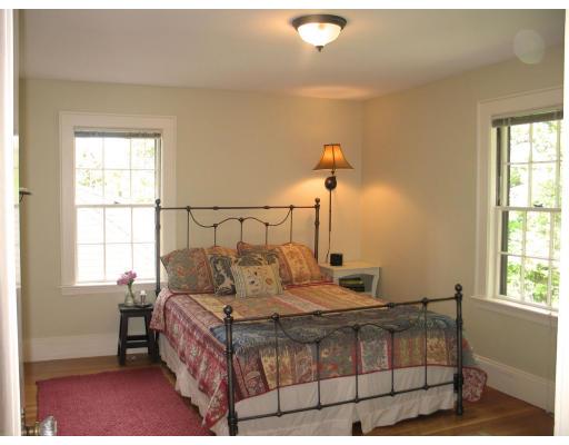 53 Dexter Road Lexington, MA 02420 - Photo 7 of 12 a bedroom with a bed and window