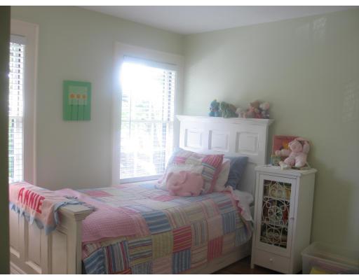 53 Dexter Road Lexington, MA 02420 - Photo 9 of 12 a bedroom with a bed and a window