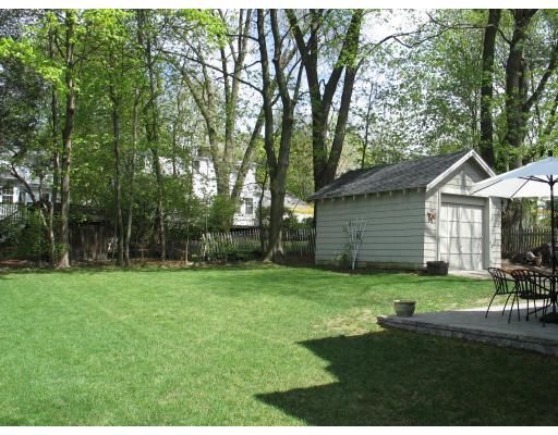 53 Dexter Road Lexington, MA 02420 - Photo 10 of 12 a view of a house with a yard