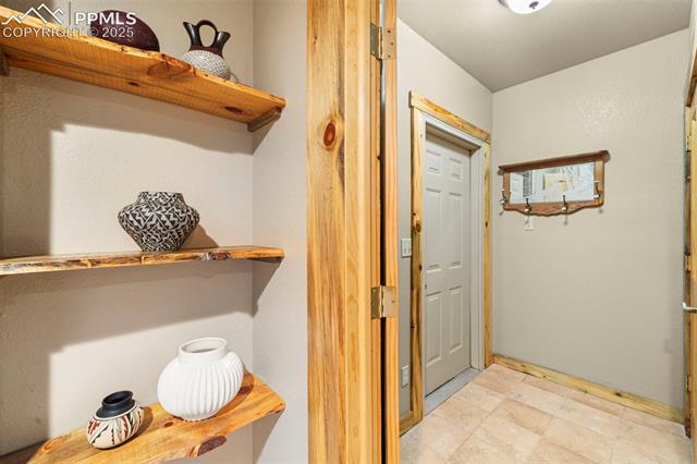 35 Toms Ranch Rd Lake Lake George, CO 80827 - Photo 31 of 50 Mudroom off attached garage, built in shelving