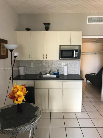 a bathroom with a toilet and a sink