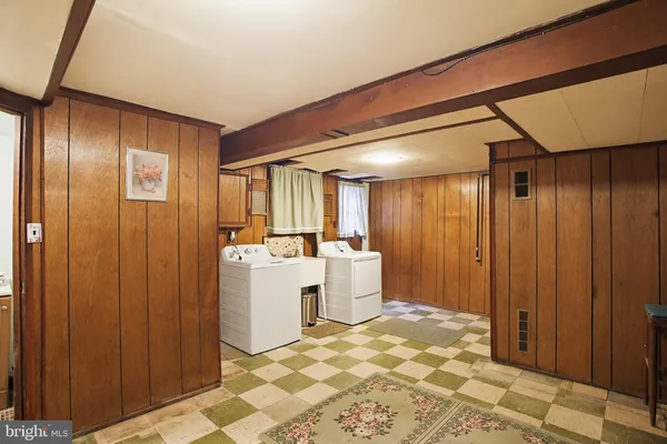 a view of a bathroom with tub and sink