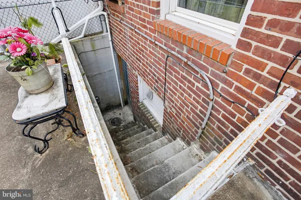 a view of balcony with a potted plant