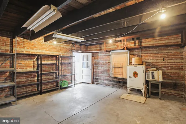 a view of a room with wooden walls