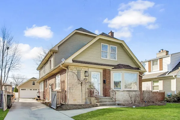 a front view of house with yard