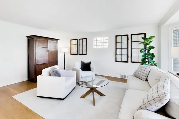 a living room with furniture and window