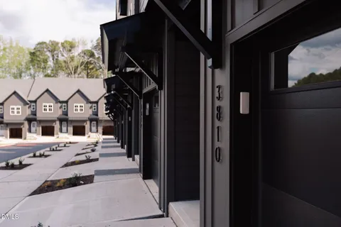 a view of a street with a building in the background