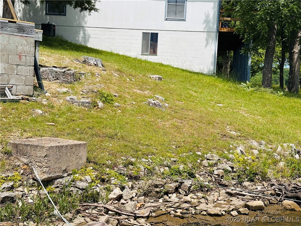 9 Point Plaza Edwards, MO 65326 - Photo 27 of 38 Natural stone seawall