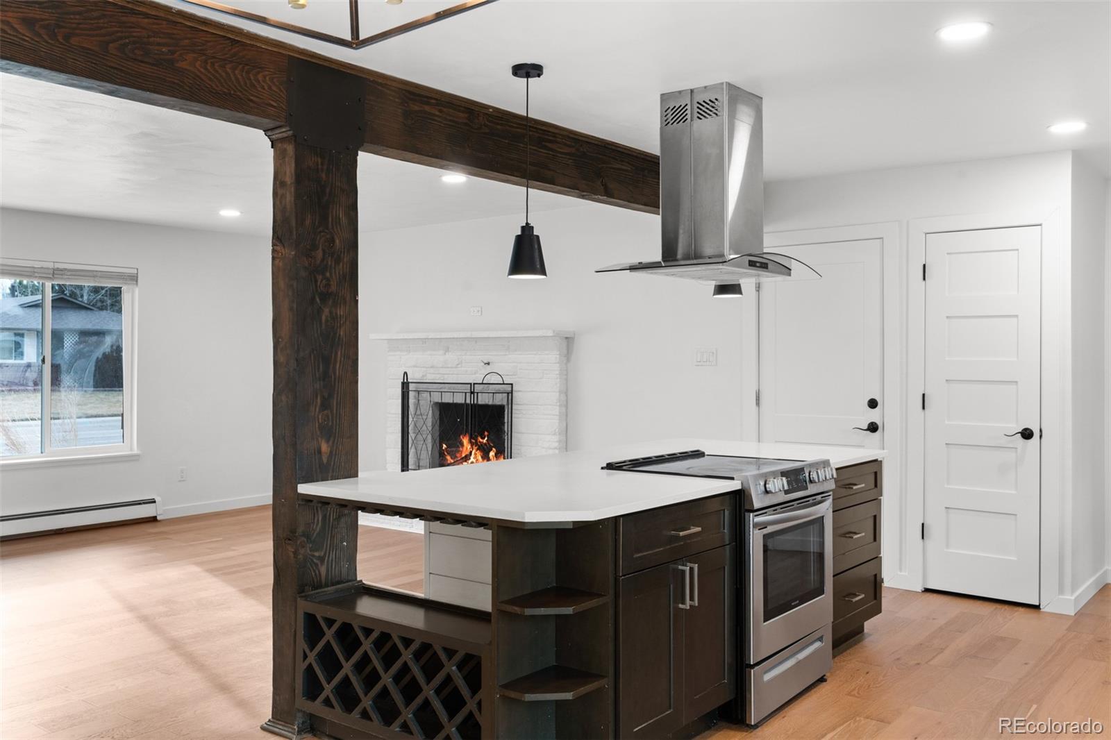 1440 Northwestern Road Longmont, CO 80503 - Photo 22 of 41 a kitchen with a stove and a sink