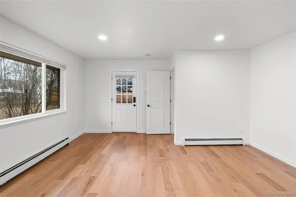 a bathroom with a bathtub and shower