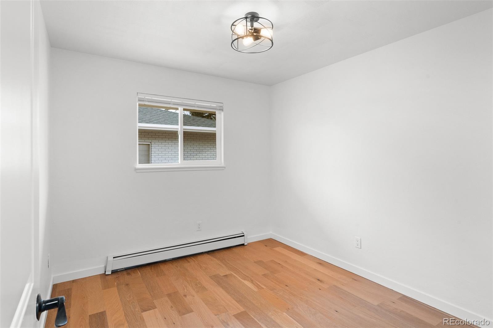 1440 Northwestern Road Longmont, CO 80503 - Photo 34 of 41 a view of an empty room with a window