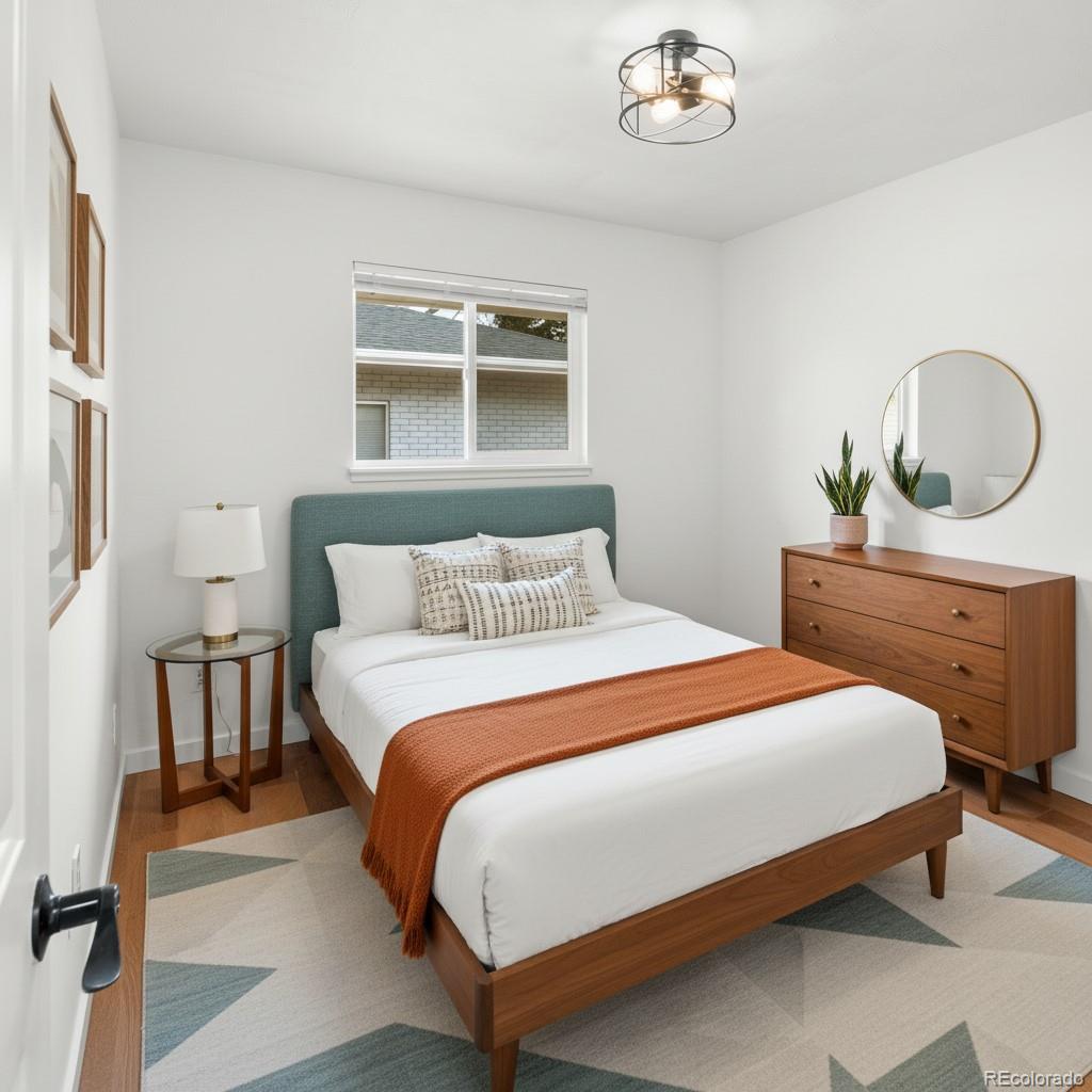 1440 Northwestern Road Longmont, CO 80503 - Photo 35 of 41 a bedroom with bed and a window