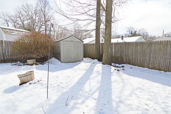 21 Hadley Street Springfield, MA 01118 - Photo 27 of 34 a backyard of a house with a tree