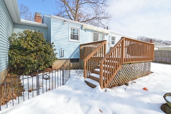 21 Hadley Street Springfield, MA 01118 - Photo 29 of 34 a view of a porch with a bench