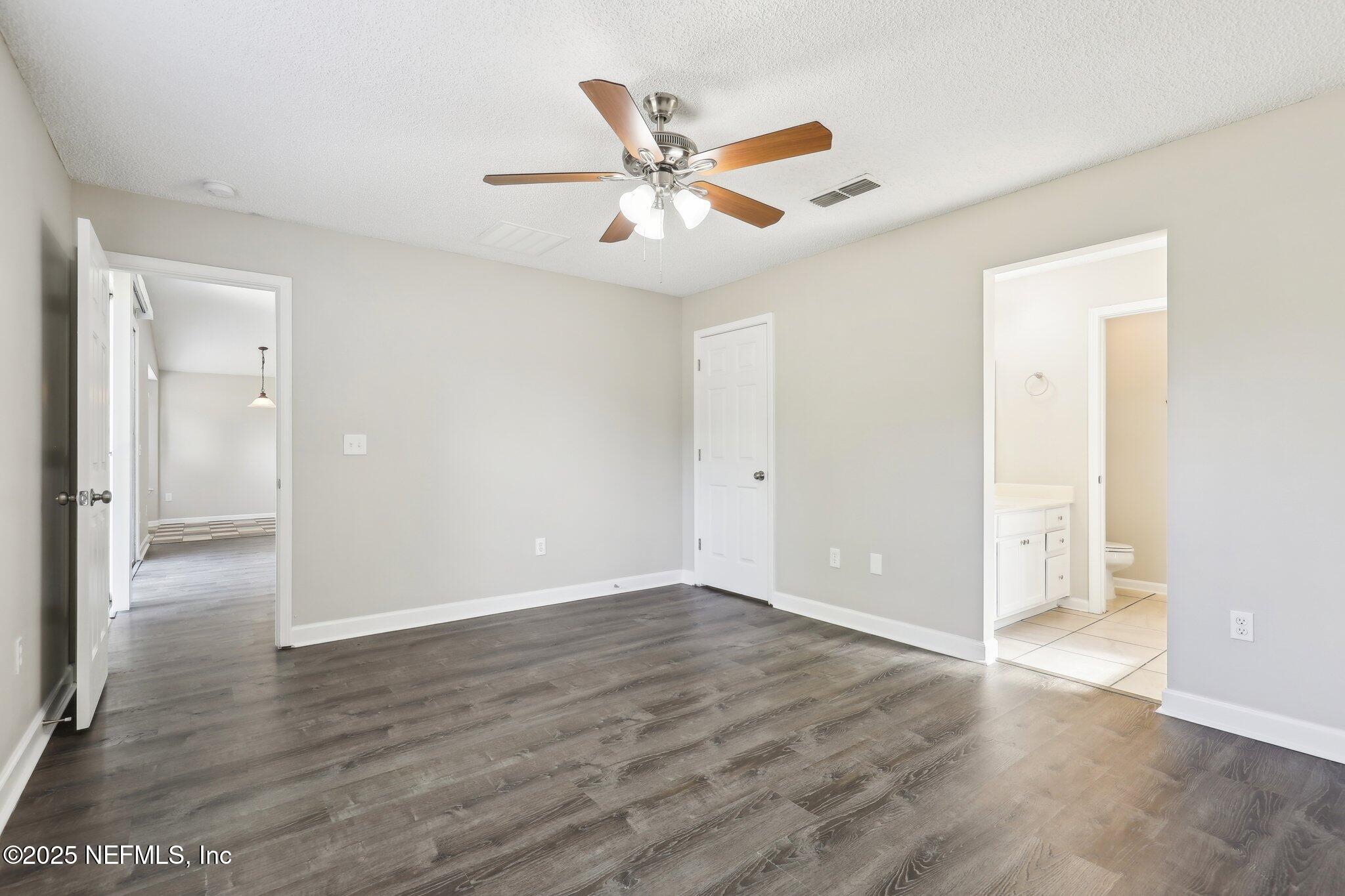 86123 Red Holly Place Yulee, FL 32097 - Photo 26 of 36 a view of an empty room