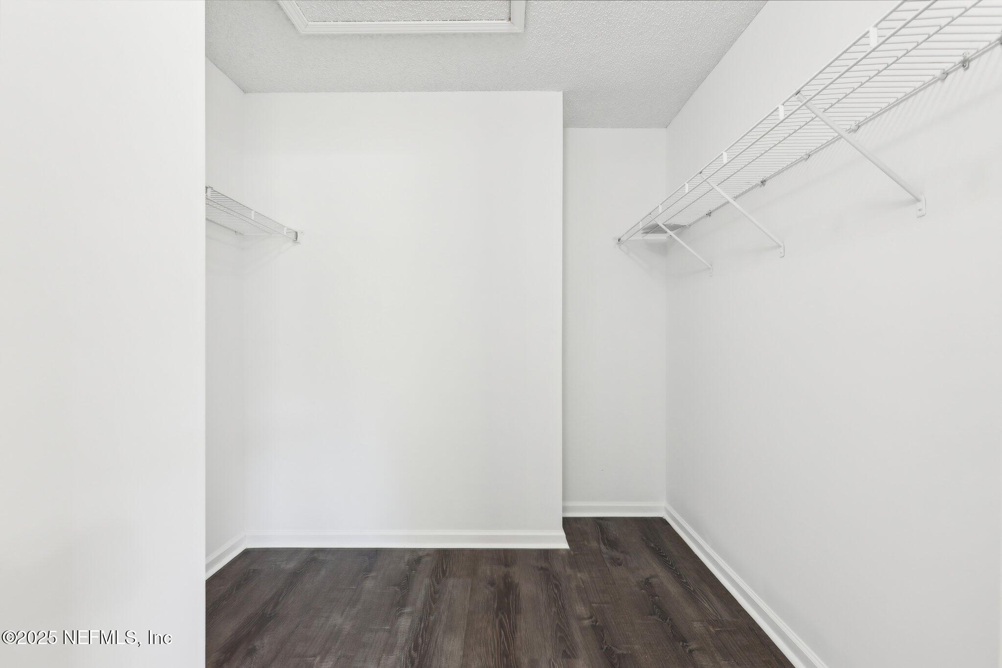 86123 Red Holly Place Yulee, FL 32097 - Photo 28 of 36 a view of small space with racks on the wall