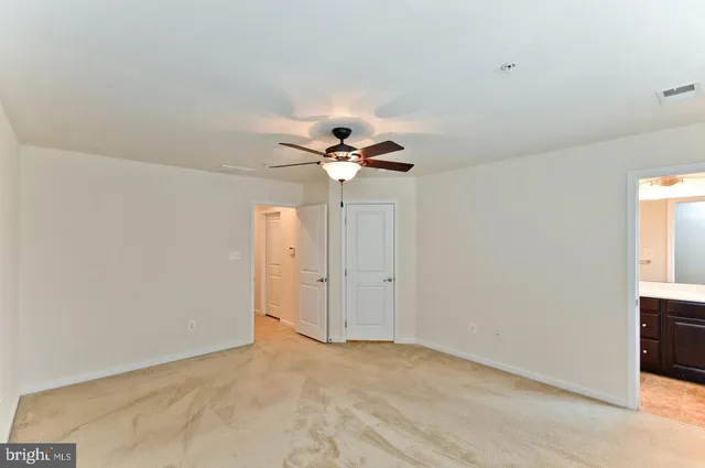 a view of empty room with window