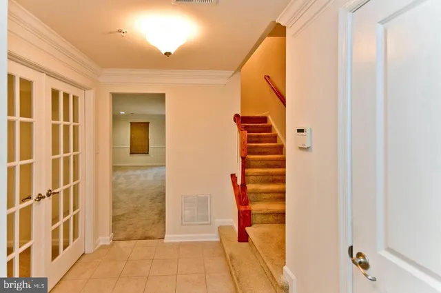 a view of a hallway with windows