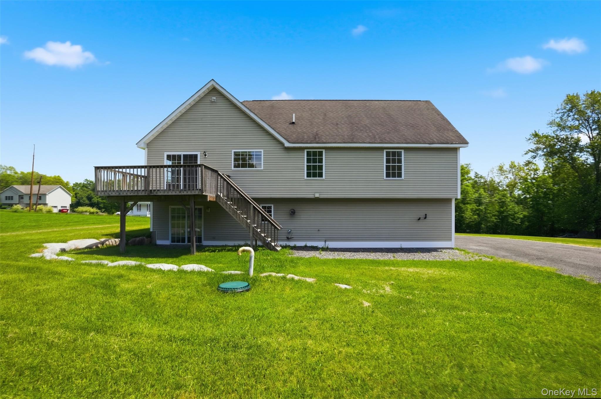 160 Pirog Road Pine Bush, NY 12566 - Photo 40 of 50 a view of a house with a yard and sitting area