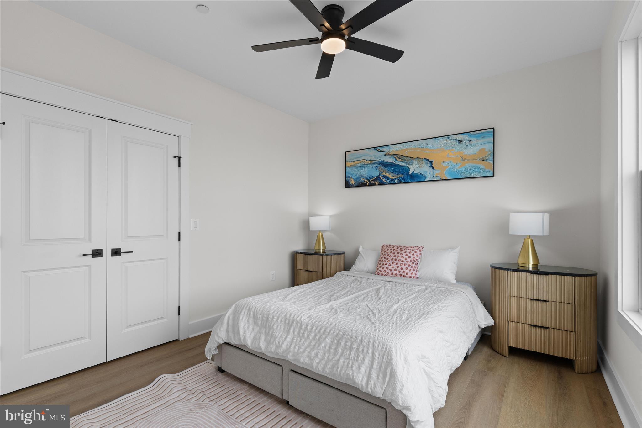 16242 Thomas Road Piney Point, MD 20674 - Photo 28 of 75 a bedroom with a bed and a night stand