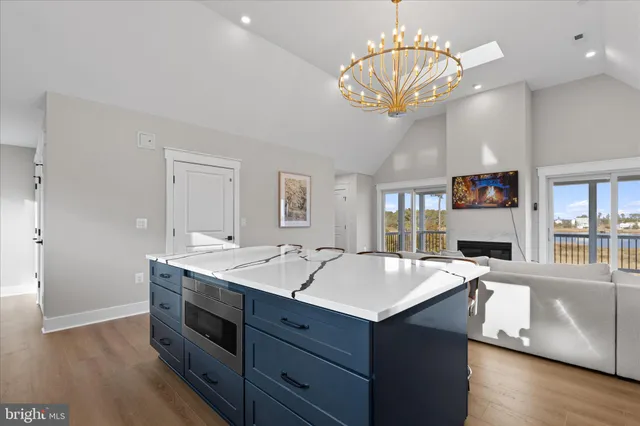 a bedroom with a bed and a ceiling fan