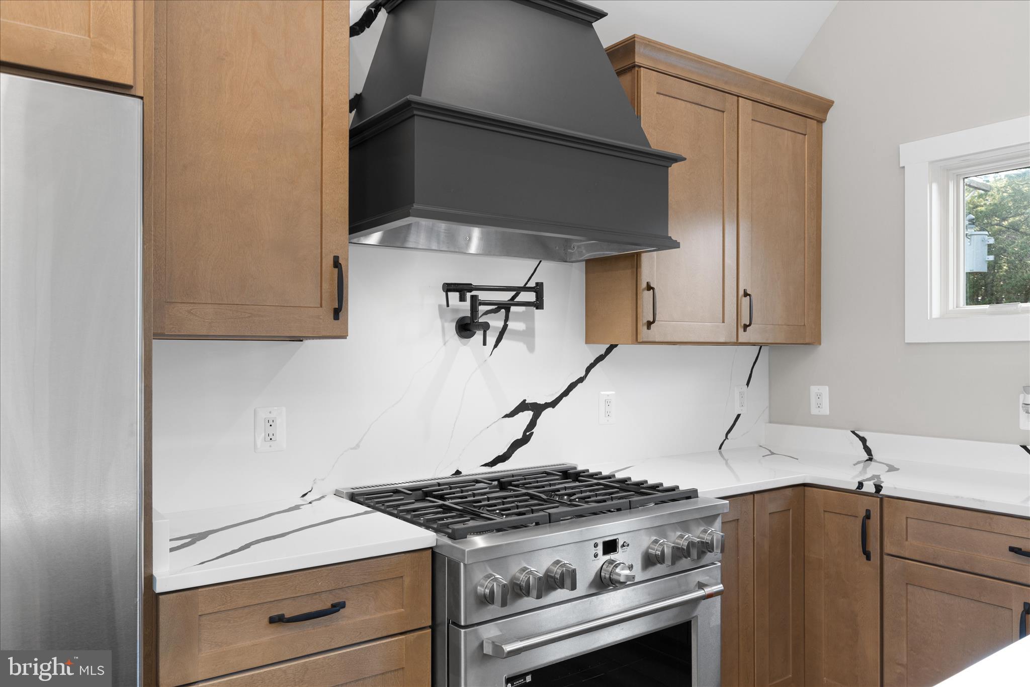 16242 Thomas Road Piney Point, MD 20674 - Photo 37 of 75 a stove top oven sitting inside of a kitchen