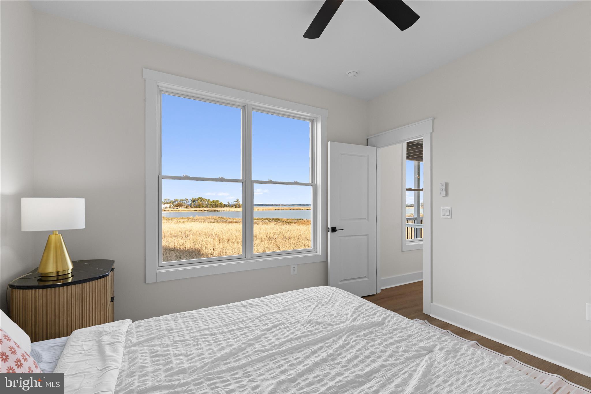 16242 Thomas Road Piney Point, MD 20674 - Photo 4 of 75 a bedroom with a bed and a window