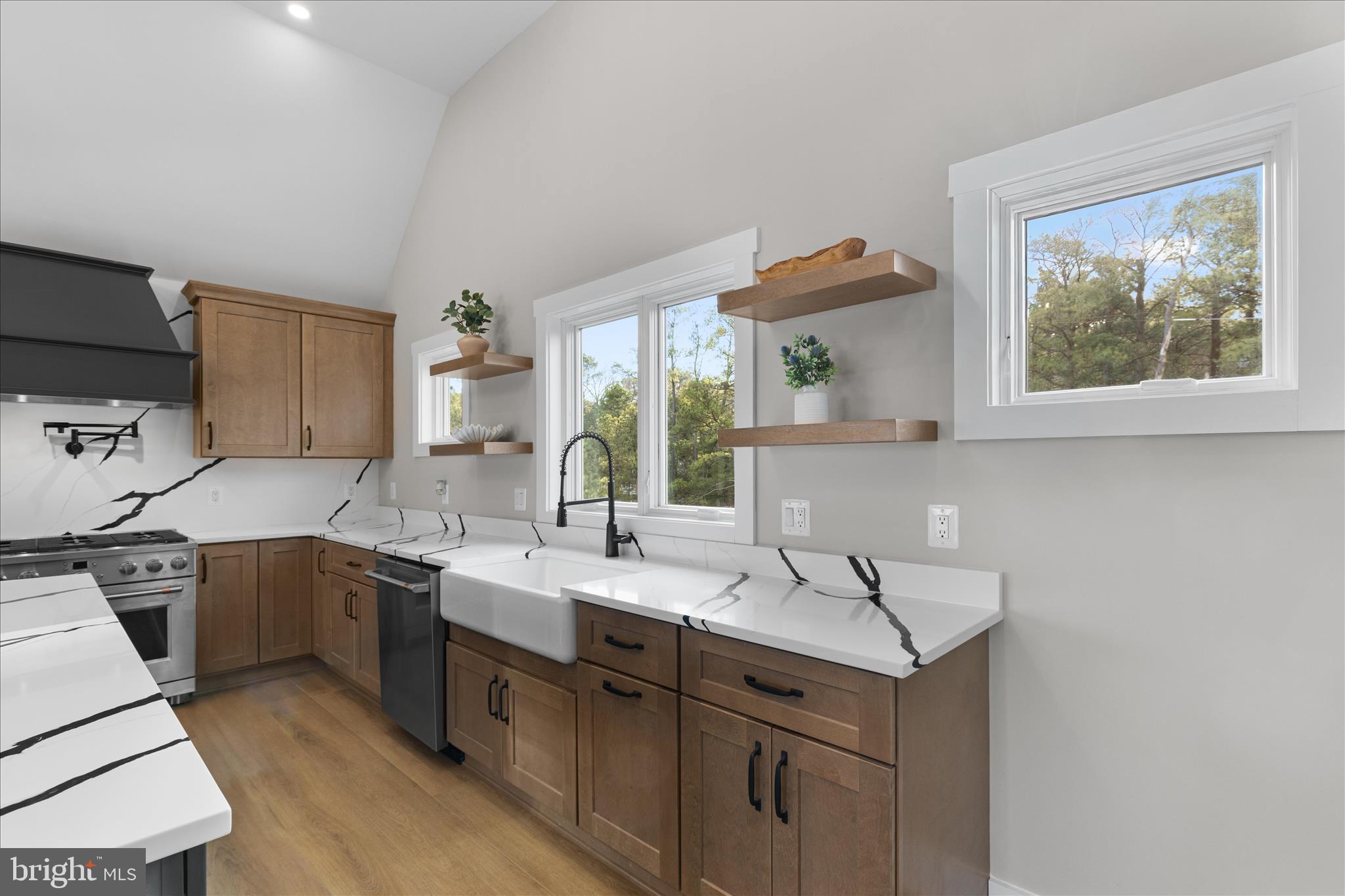 16242 Thomas Road Piney Point, MD 20674 - Photo 41 of 75 a kitchen with a sink stove and cabinets