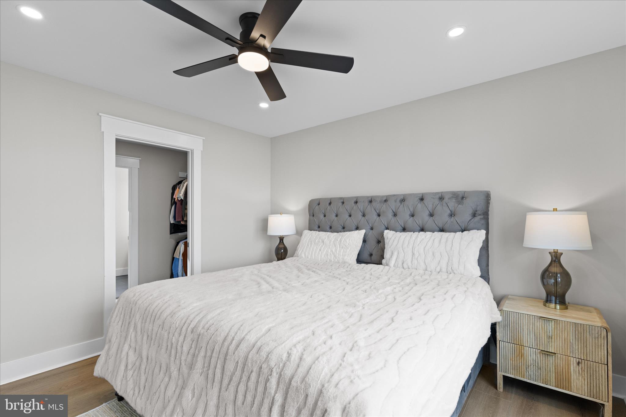 16242 Thomas Road Piney Point, MD 20674 - Photo 44 of 75 a bedroom with a bed and a ceiling fan
