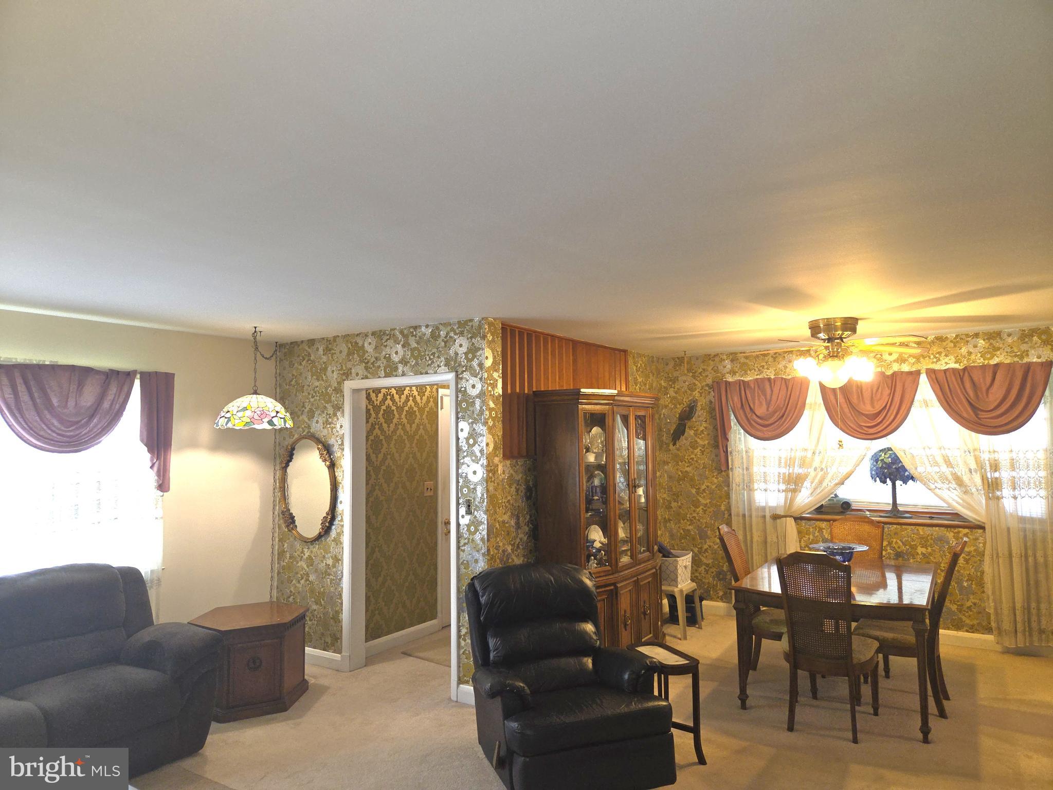 305 Bowleys Quarters Road Middle River, MD 21220 - Photo 27 of 55 a view of a livingroom with furniture and a chandelier