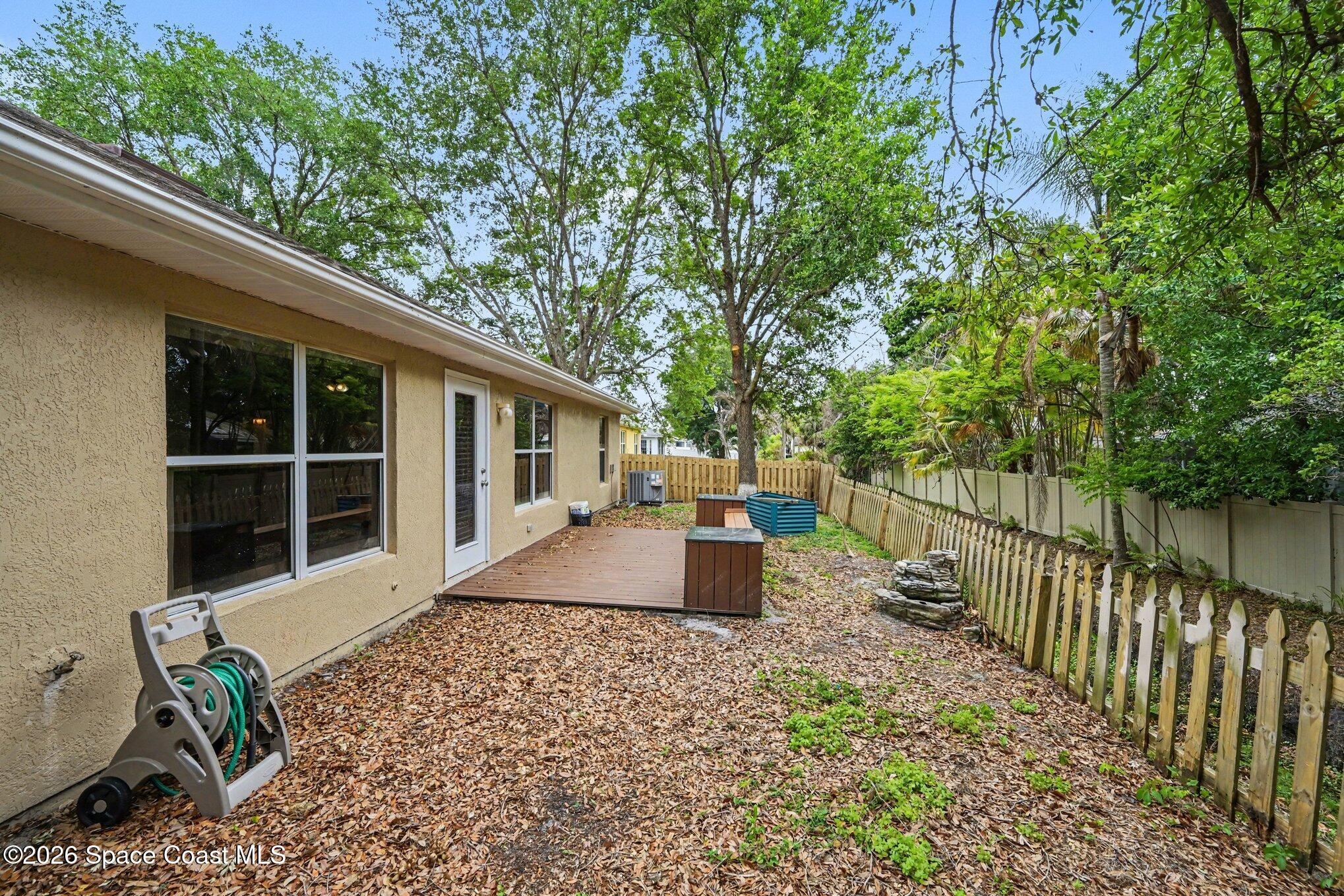 558 Barber Street Sebastian, FL 32958 - Photo 25 of 25 a front view of a house with a garden