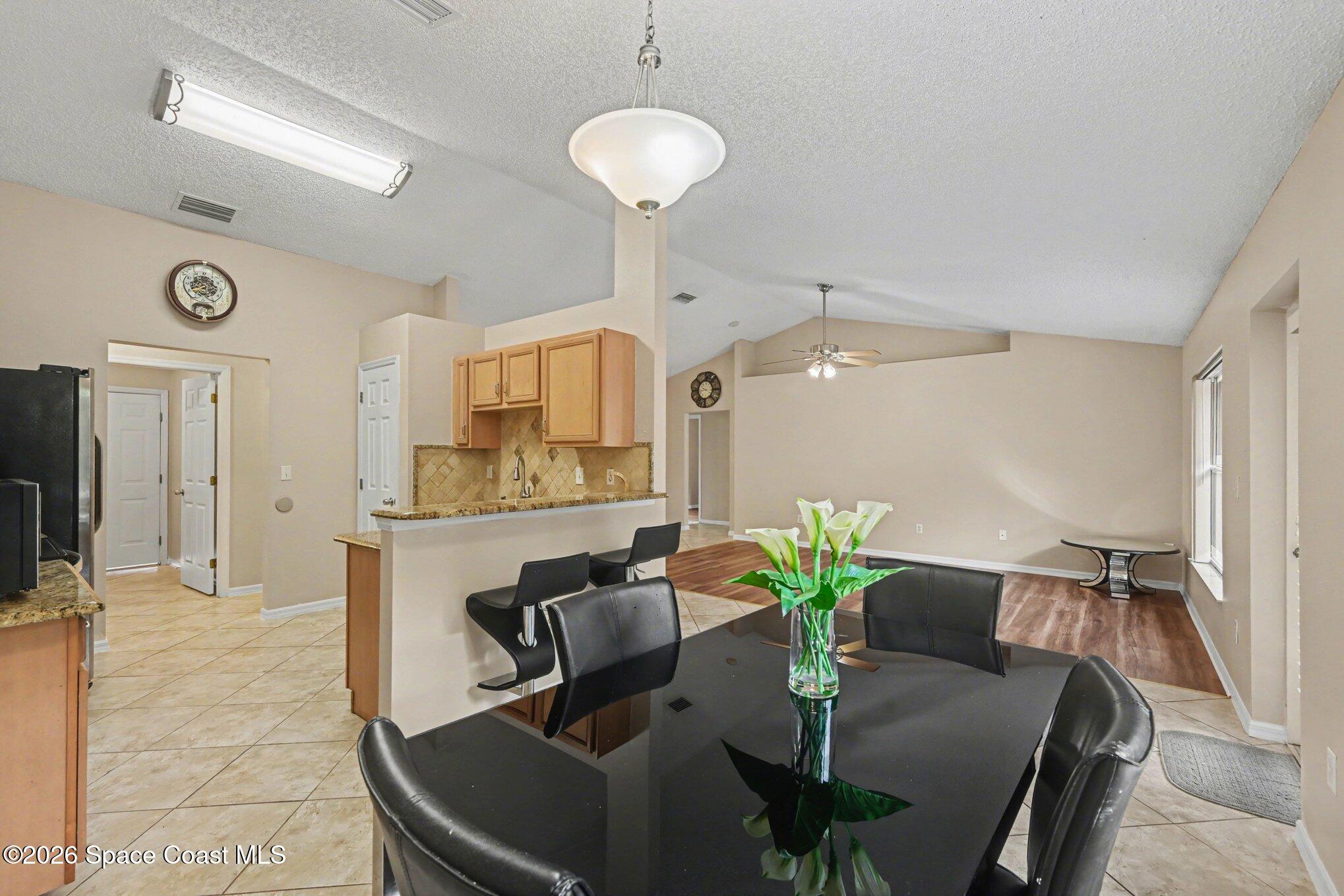 558 Barber Street Sebastian, FL 32958 - Photo 7 of 25 a view of a dining room with furniture
