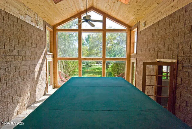 a view of porch with a small yard