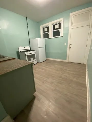 a view of a room with washer and dryer