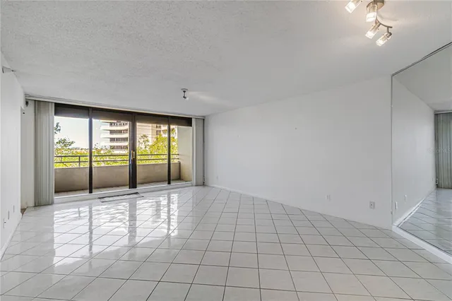 a view of an empty room and window