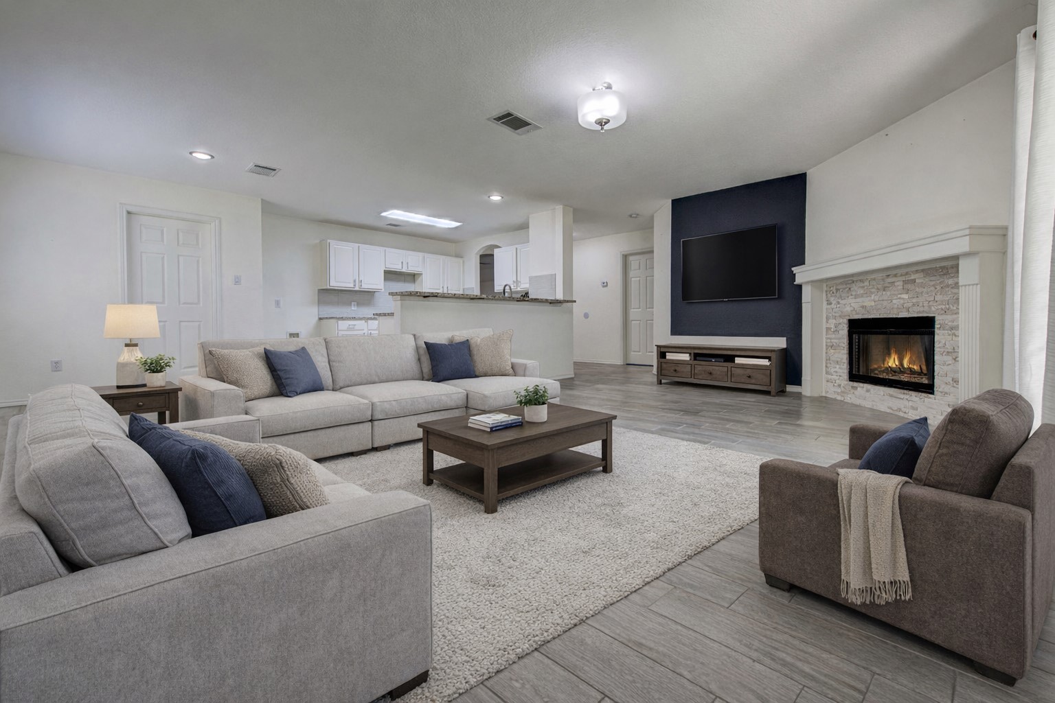 5908 Krinan Court Austin, TX 78754 - Photo 14 of 31 a living room with furniture and a fireplace