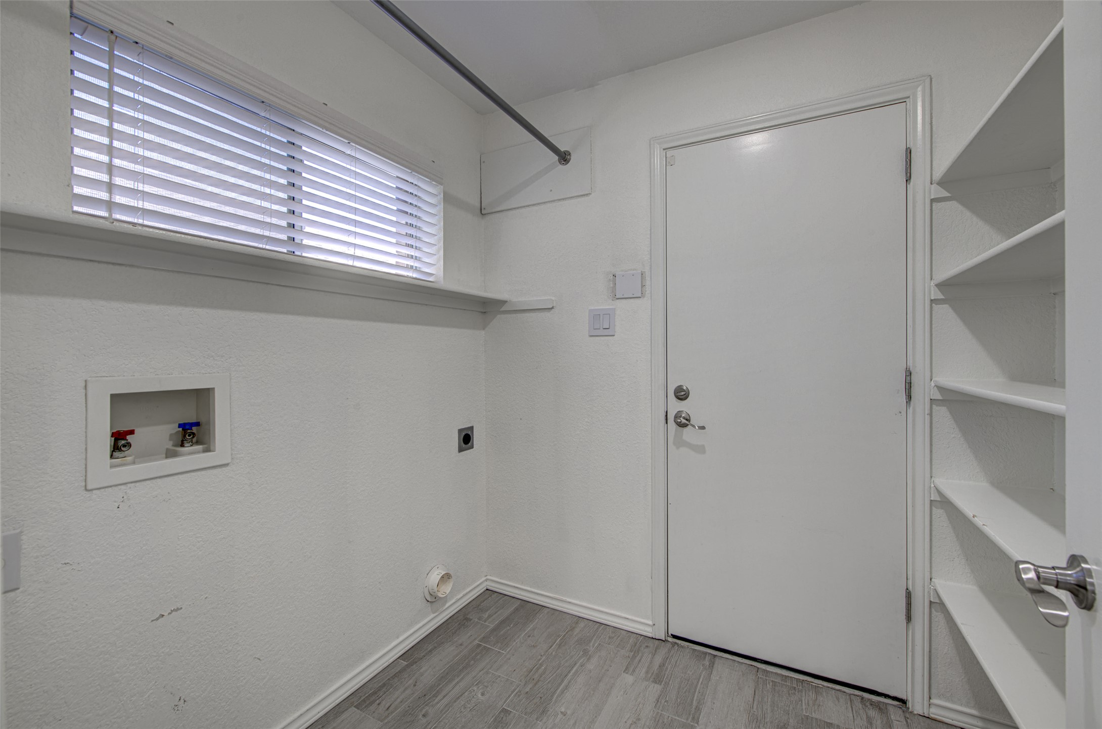 5908 Krinan Court Austin, TX 78754 - Photo 17 of 31 a view of a room that has a window in it