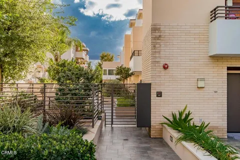 a view of a pathway both side of building