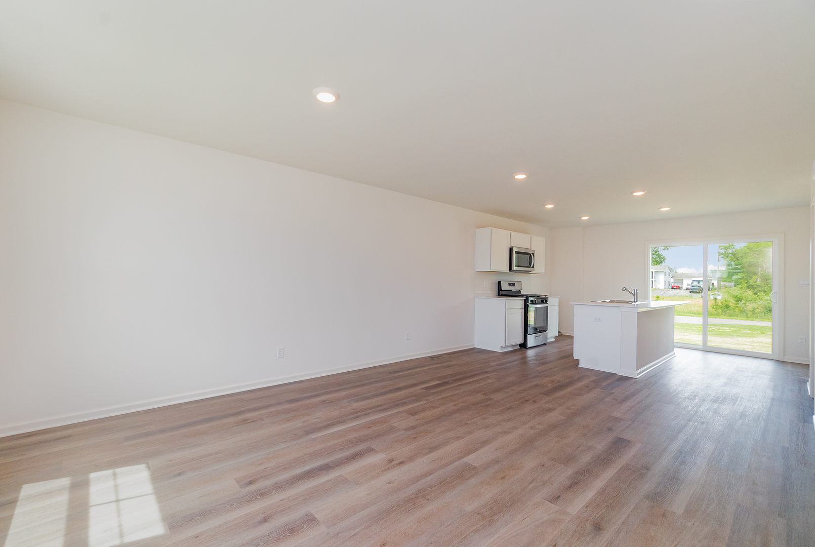 600 Adirondack Court Joliet, IL 60421 - Photo 7 of 19 a view of a kitchen with wooden floor