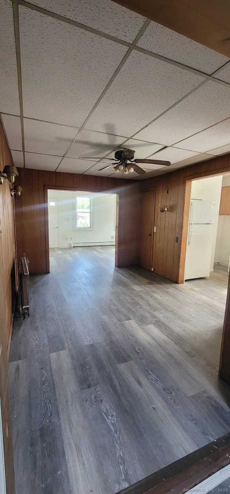183 High Street Sprague, CT 06330 - Photo 8 of 10 a view of a room with wooden floor