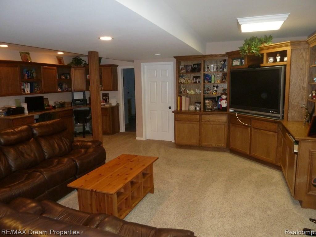 47890 Gladstone Road Canton, MI 48188 - Photo 35 of 45 LOWER LEVEL FAMILY.jpg