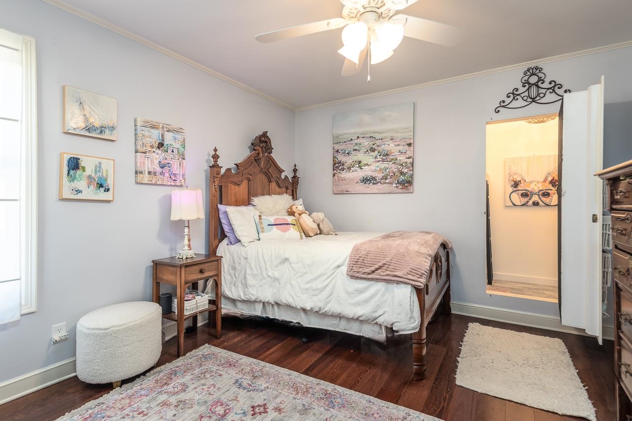 4723 Gwynne Road Memphis, TN 38117 - Photo 17 of 40 a bedroom with a bed and a window
