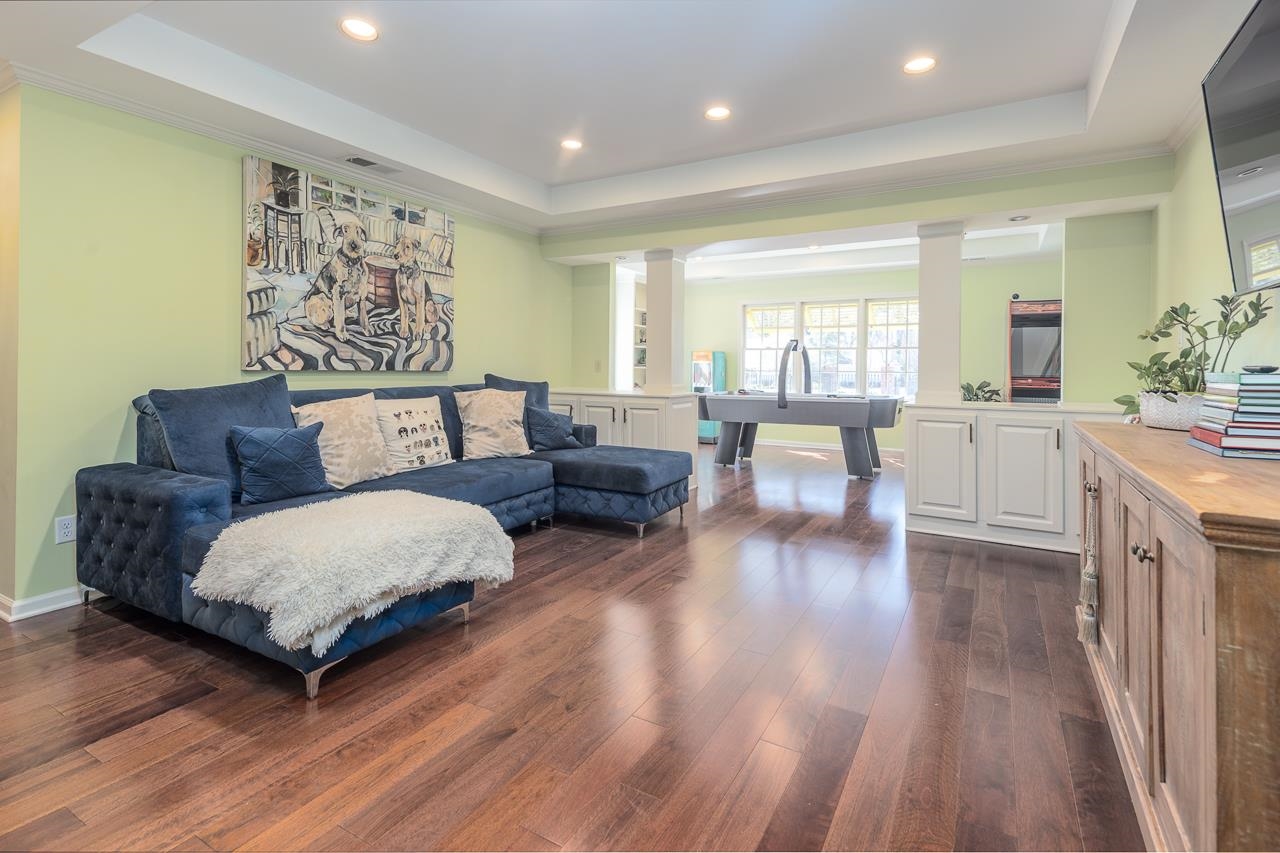 4723 Gwynne Road Memphis, TN 38117 - Photo 28 of 40 a living room with furniture and wooden floor