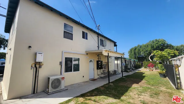 a view of car parked in front of house