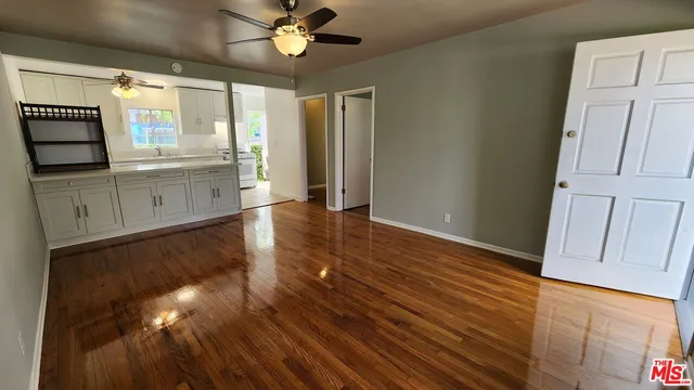 a view of a kitchen with electric appliances