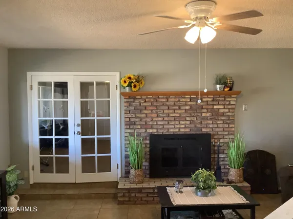 a kitchen with stainless steel appliances a stove a sink a microwave a refrigerator and cabinets