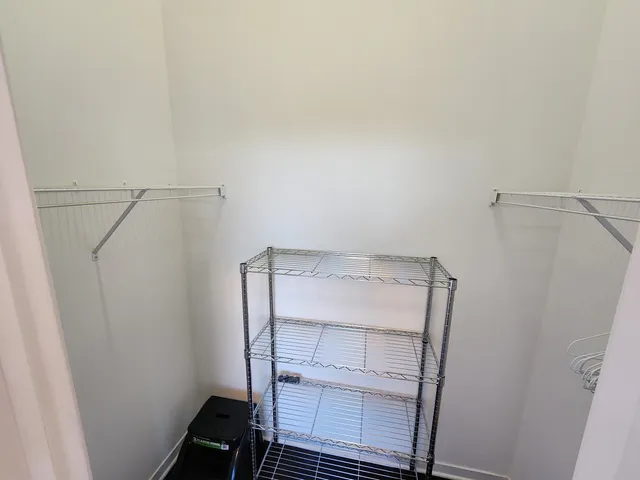 a bathroom with a shower and toilet